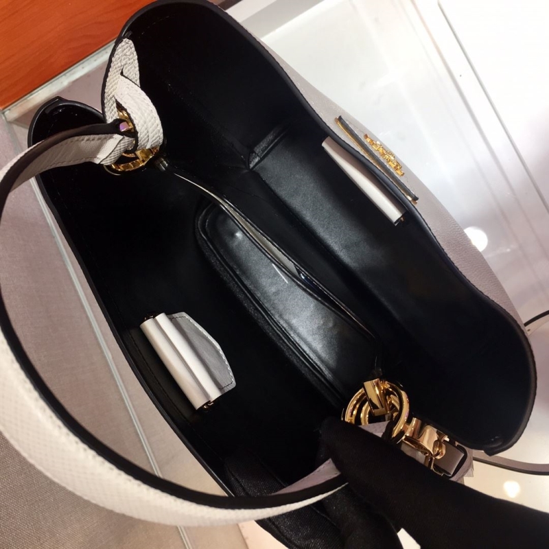 Pra*a top handle bags
